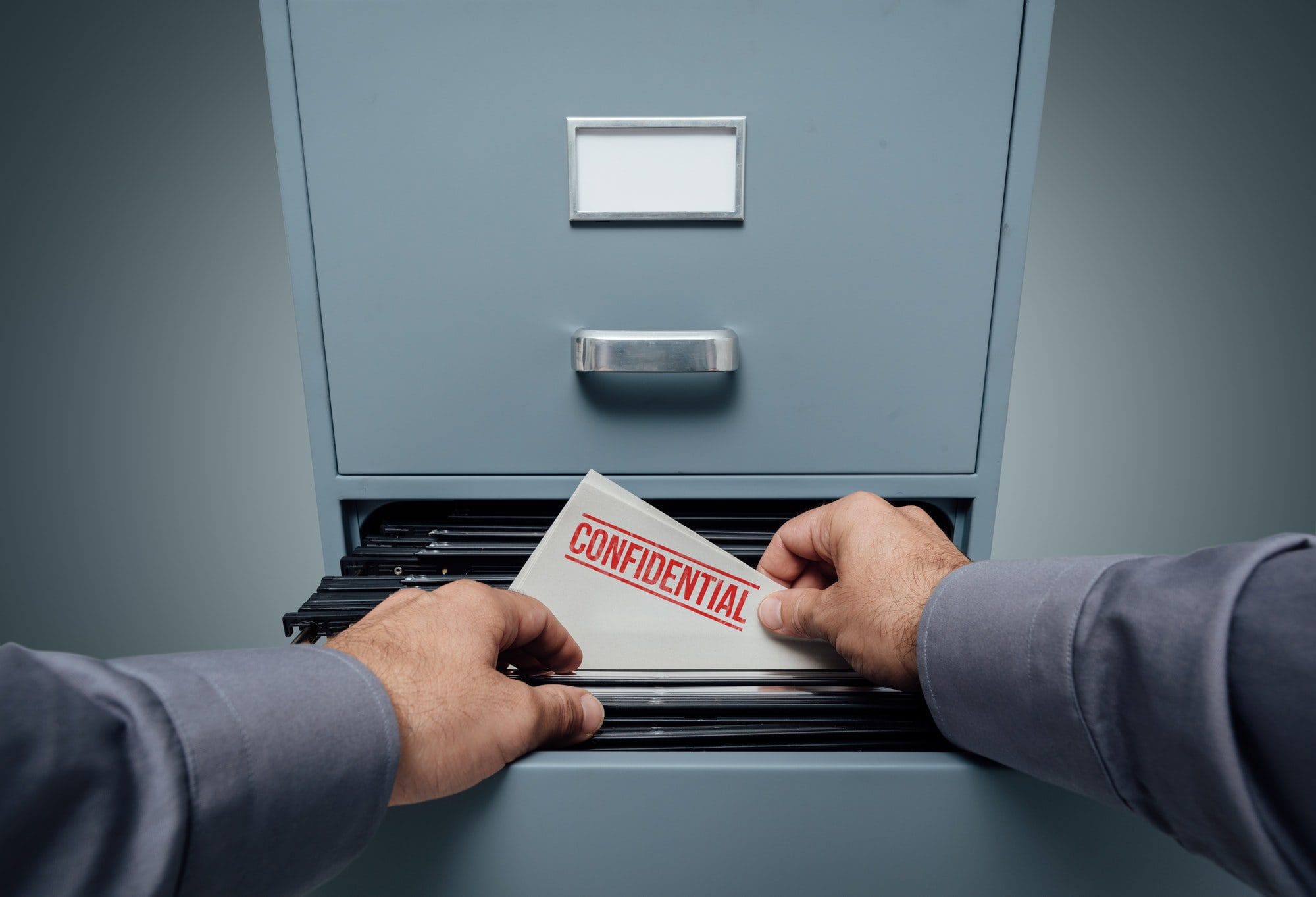 File showing confidential information that shouldn't be shared to protect yourself from Medicare fraud.