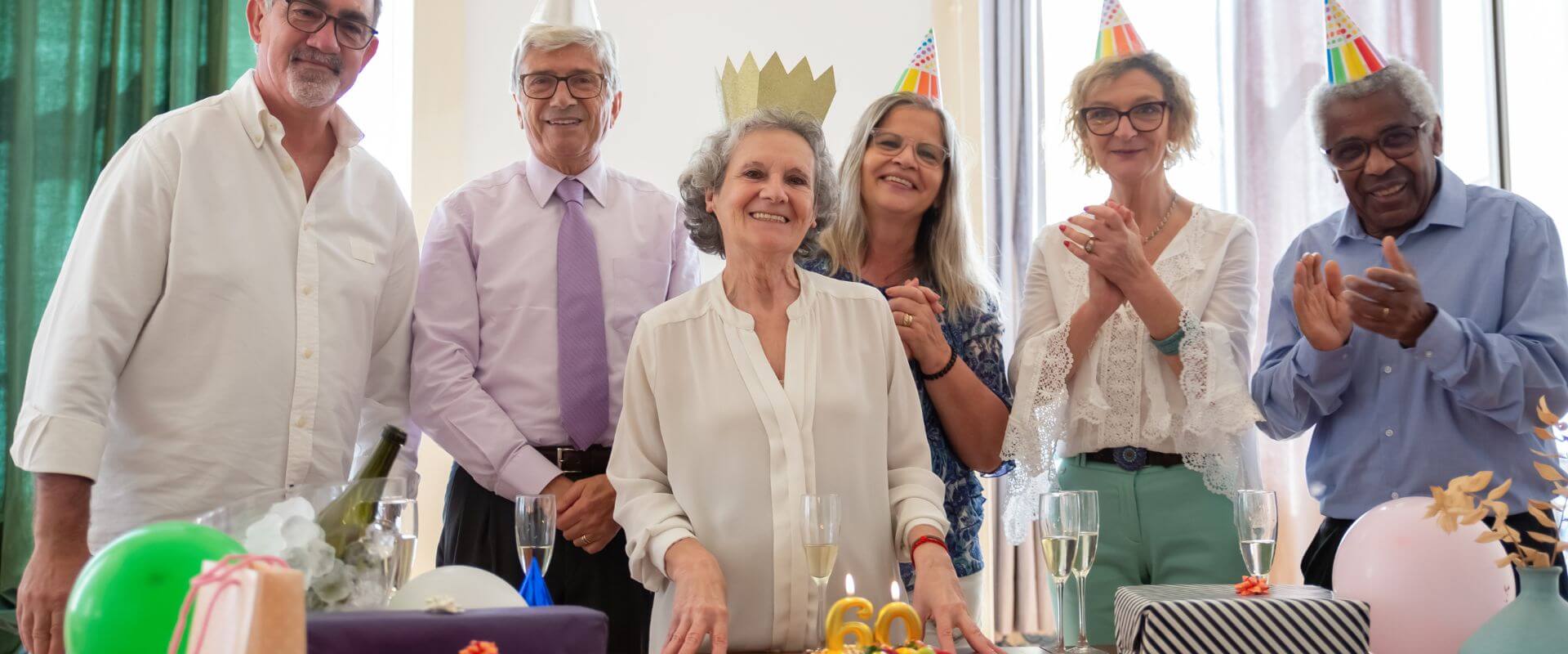 Happy senior group celebrating Medicare Giveback benefit